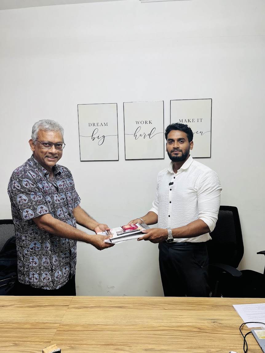 An Atrium client receiving their agreement documents at the office